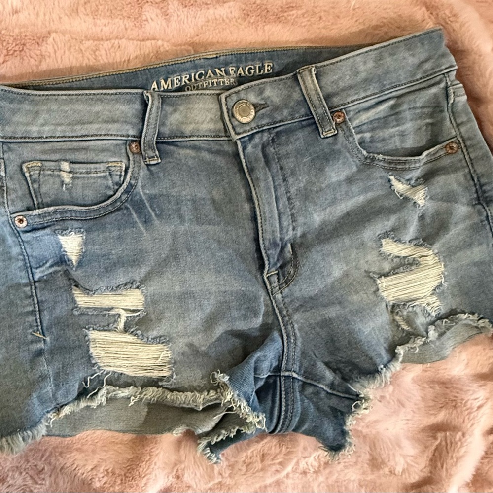 American Eagle Outfitters Light Wash Distressed Jean “shortie” shorts